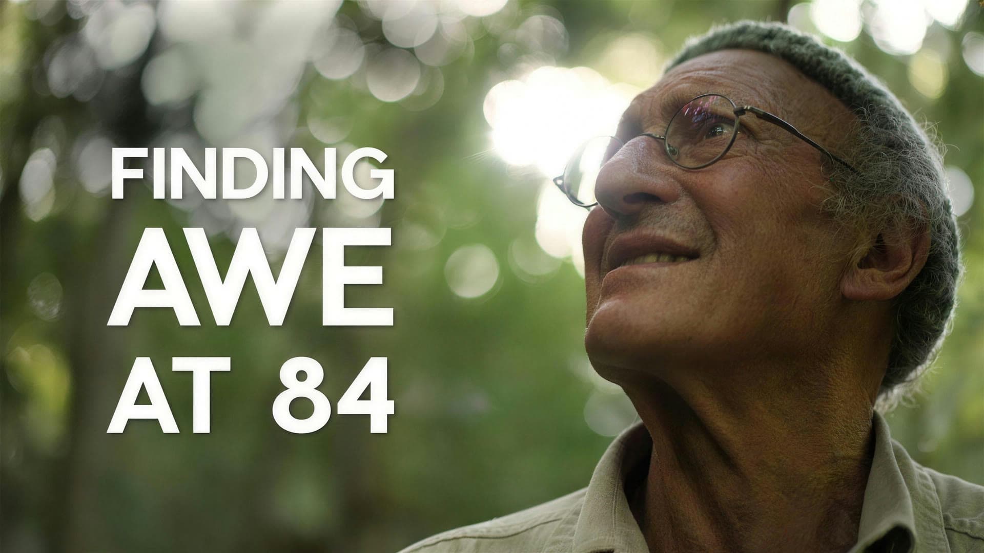 Dr Bernard Brom in a forest, looking upward — a still from the short film on the origins of Creating Health